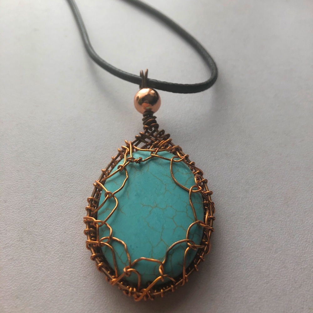 Teal Rock Designed with Bronze Coil